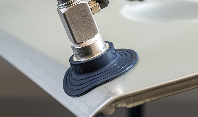 Flat vacuum cups for handling of strongly curved metal sheets – NBR